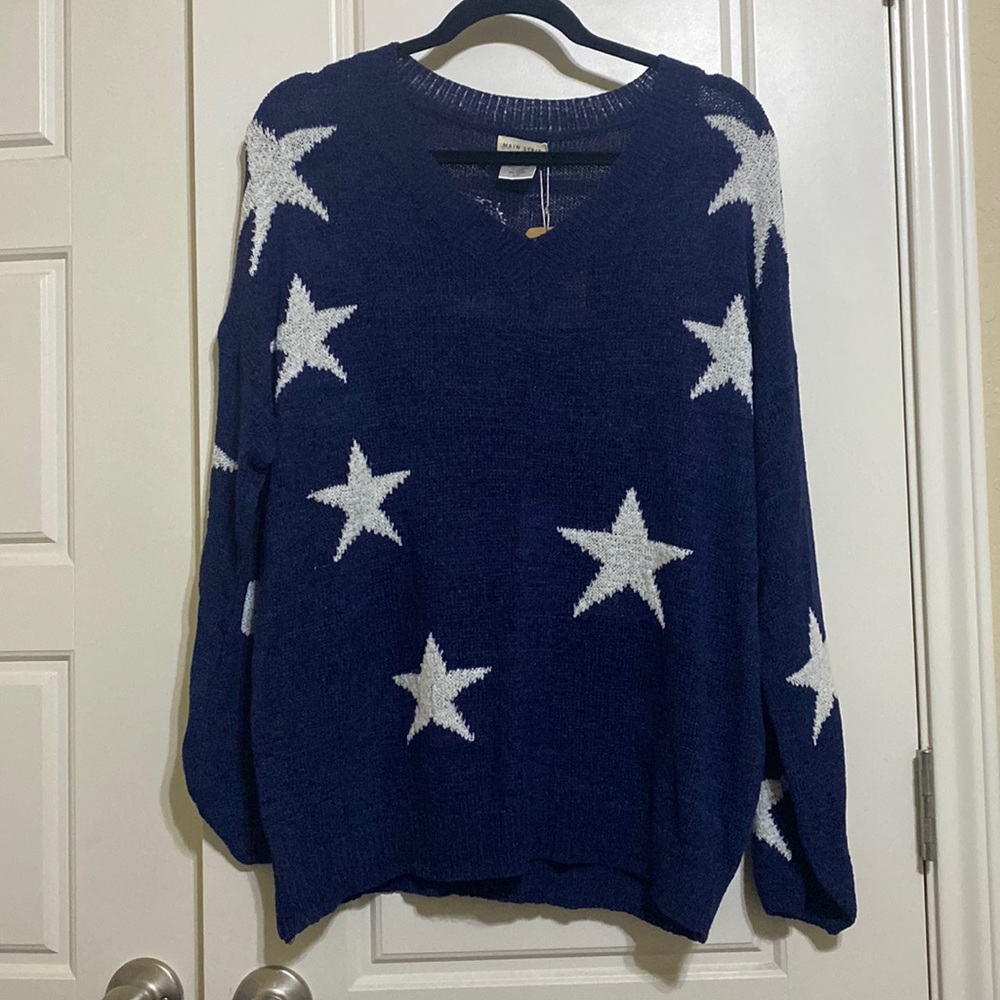 Boutique navy sweater with stars